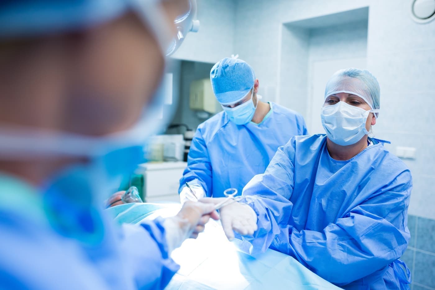 Surgical team during a minimally invasive operation