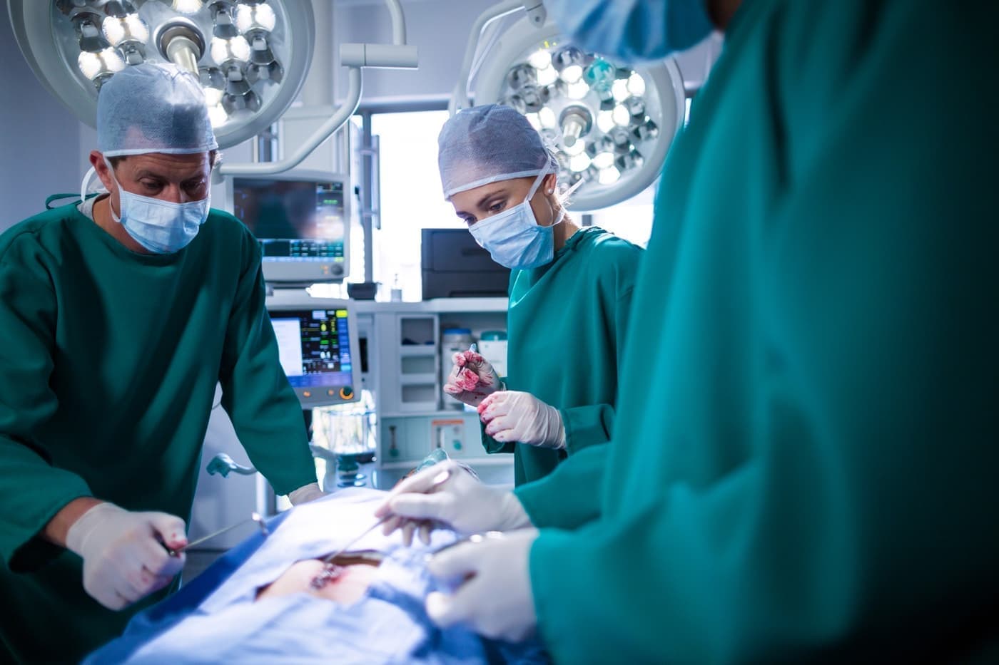 Surgical team in a hospital operating theatre