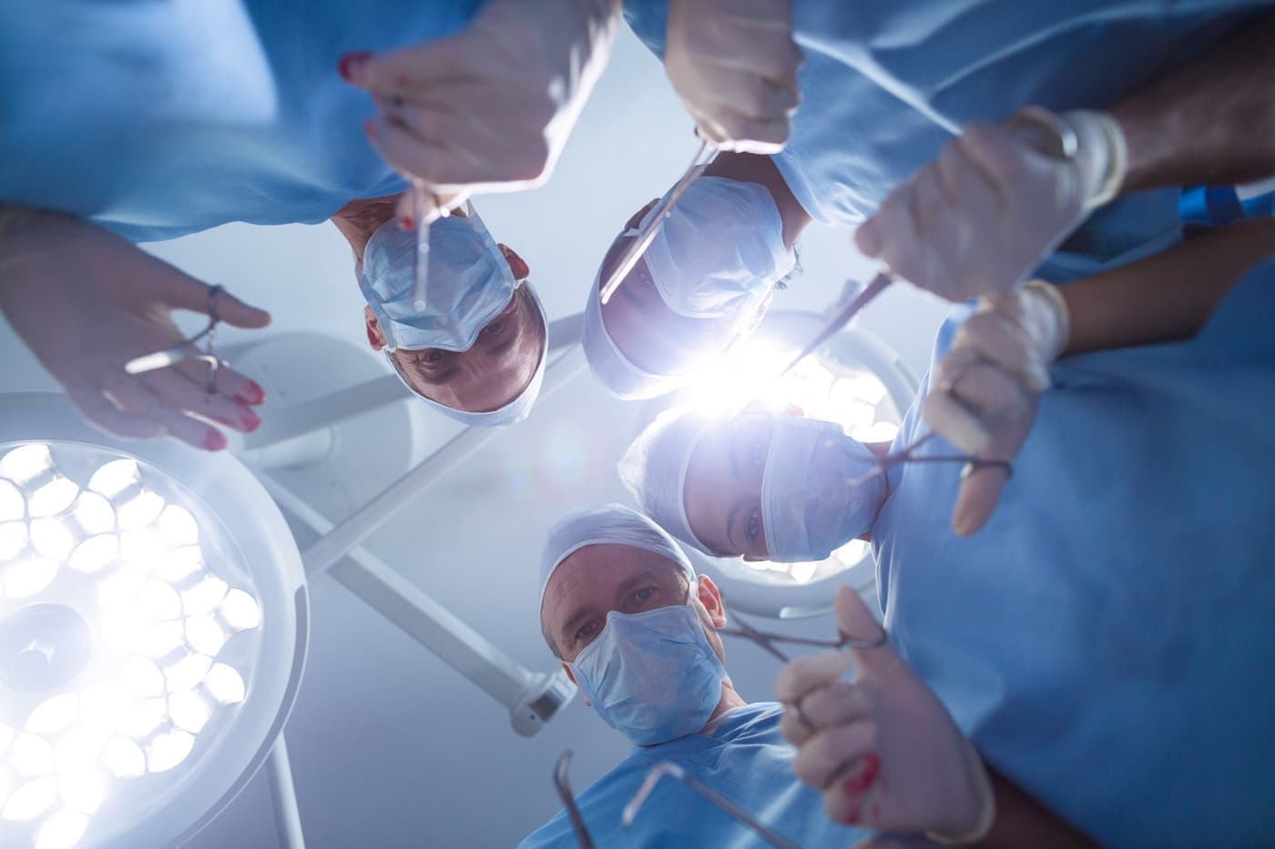 Surgical team performing a procedure in the operating room